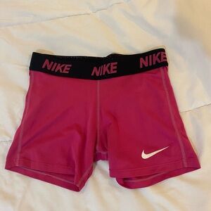 Nike Pink Athletic Compression Shorts with Moisture-Wicking Fabric